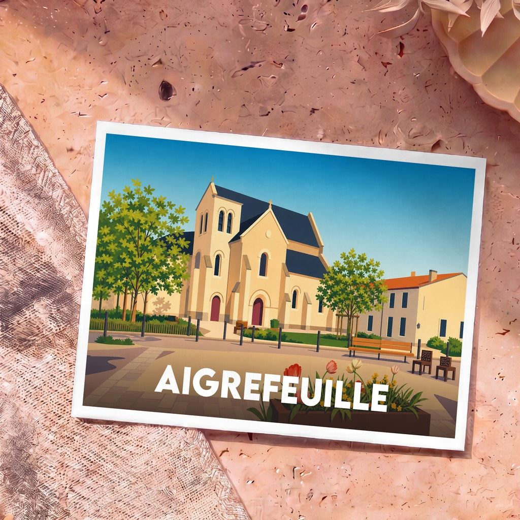 Carte postale souvenir de la ville d'Aigrefeuille avec une illustration stylisée de son église et d'une place fleurie.