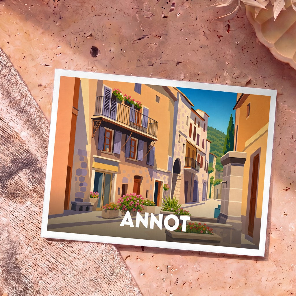Carte postale souvenir de la ville d'Annot illustrant une ruelle provençale ensoleillée et fleurie.