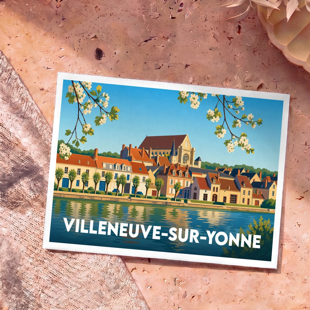 Carte postale souvenir de Villeneuve-sur-Yonne illustrant les bords de l'Yonne avec son architecture typique et son église.