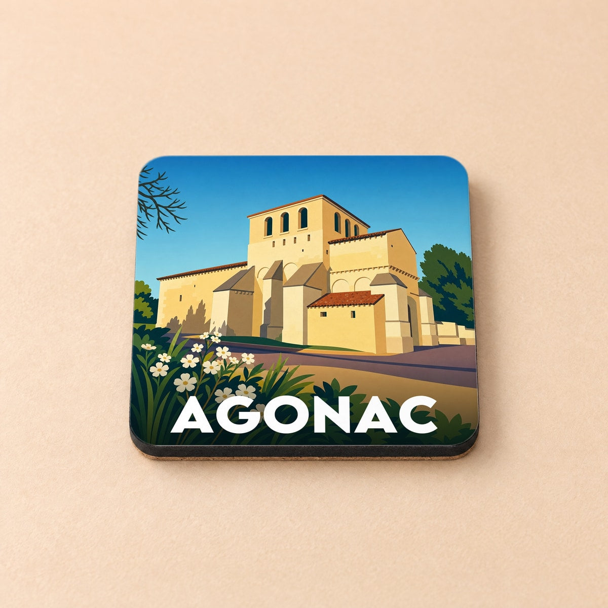 Dessous de verre souvenir de la ville d'Agonac avec une illustration stylisée de son église romane.