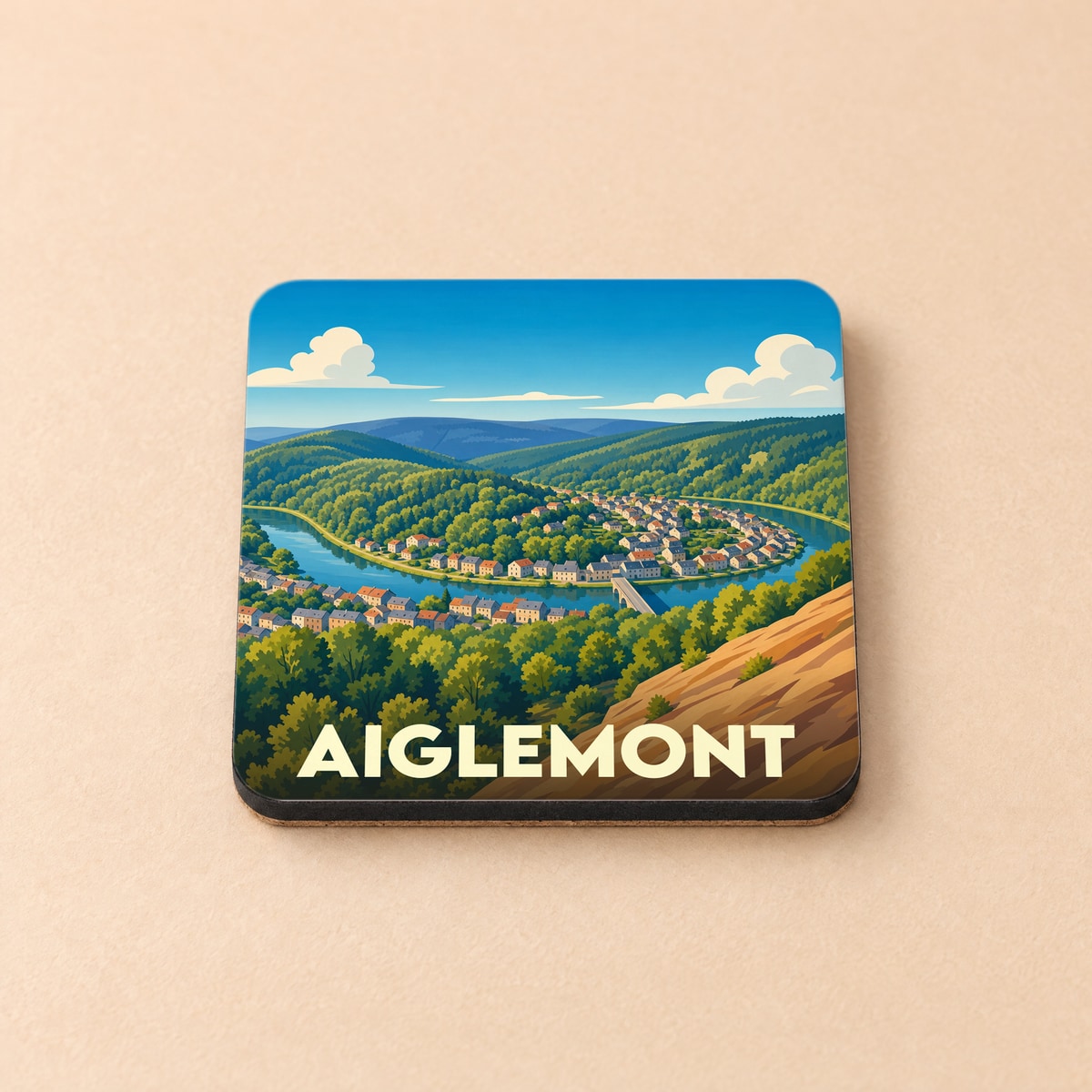 Dessous de verre souvenir de la ville de Aiglemont avec une illustration stylisée d'un méandre de rivière.