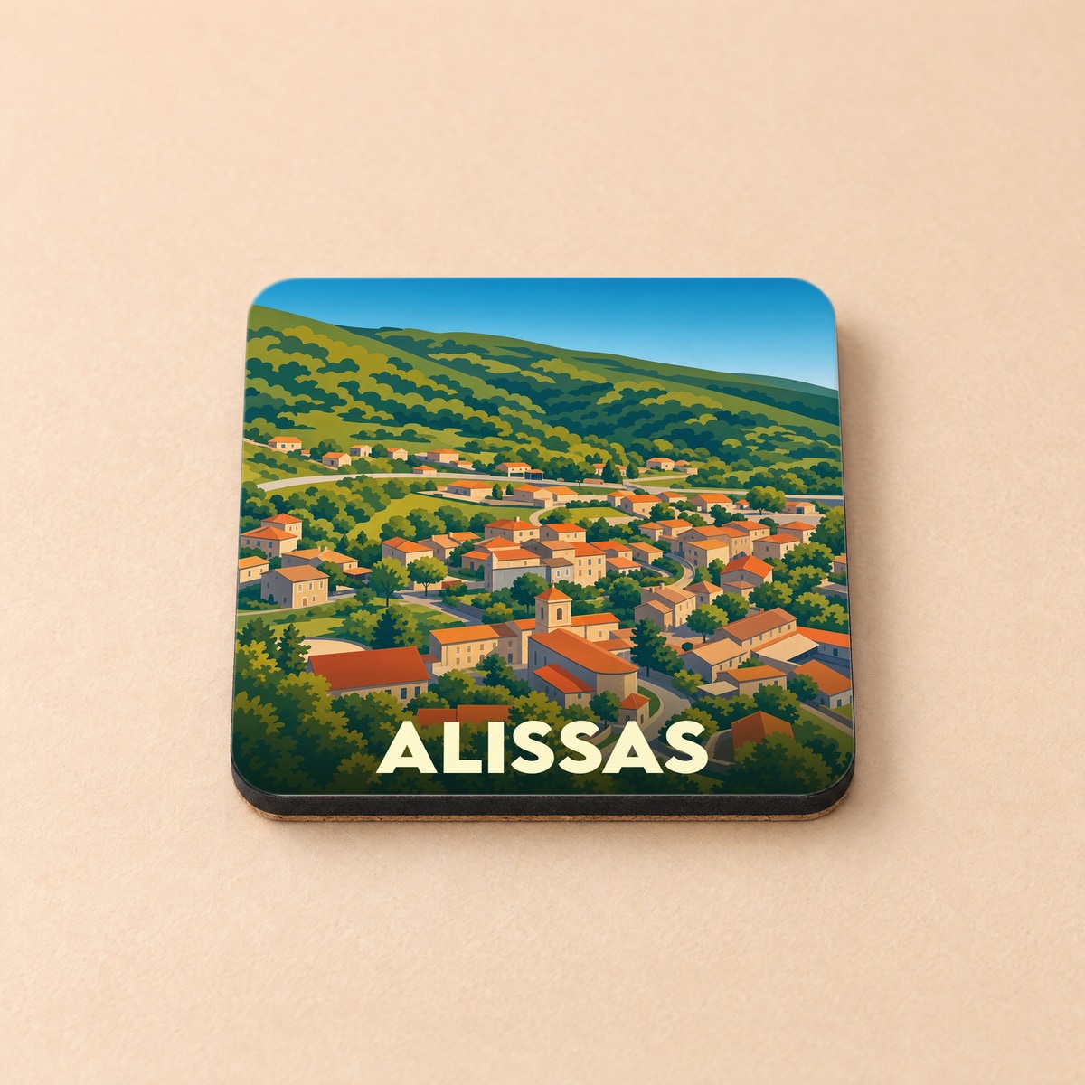 Dessous de verre souvenir de la ville d'Alissas avec une illustration stylisée d'un village provençal niché dans les collines.