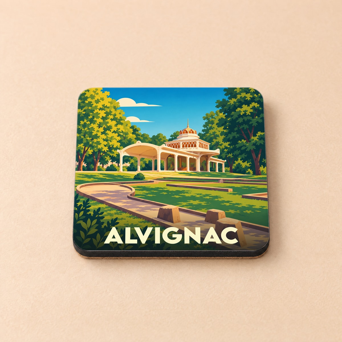 Dessous de verre souvenir de la ville d'Alvignac illustré d'un pavillon au milieu d'un parc arboré.