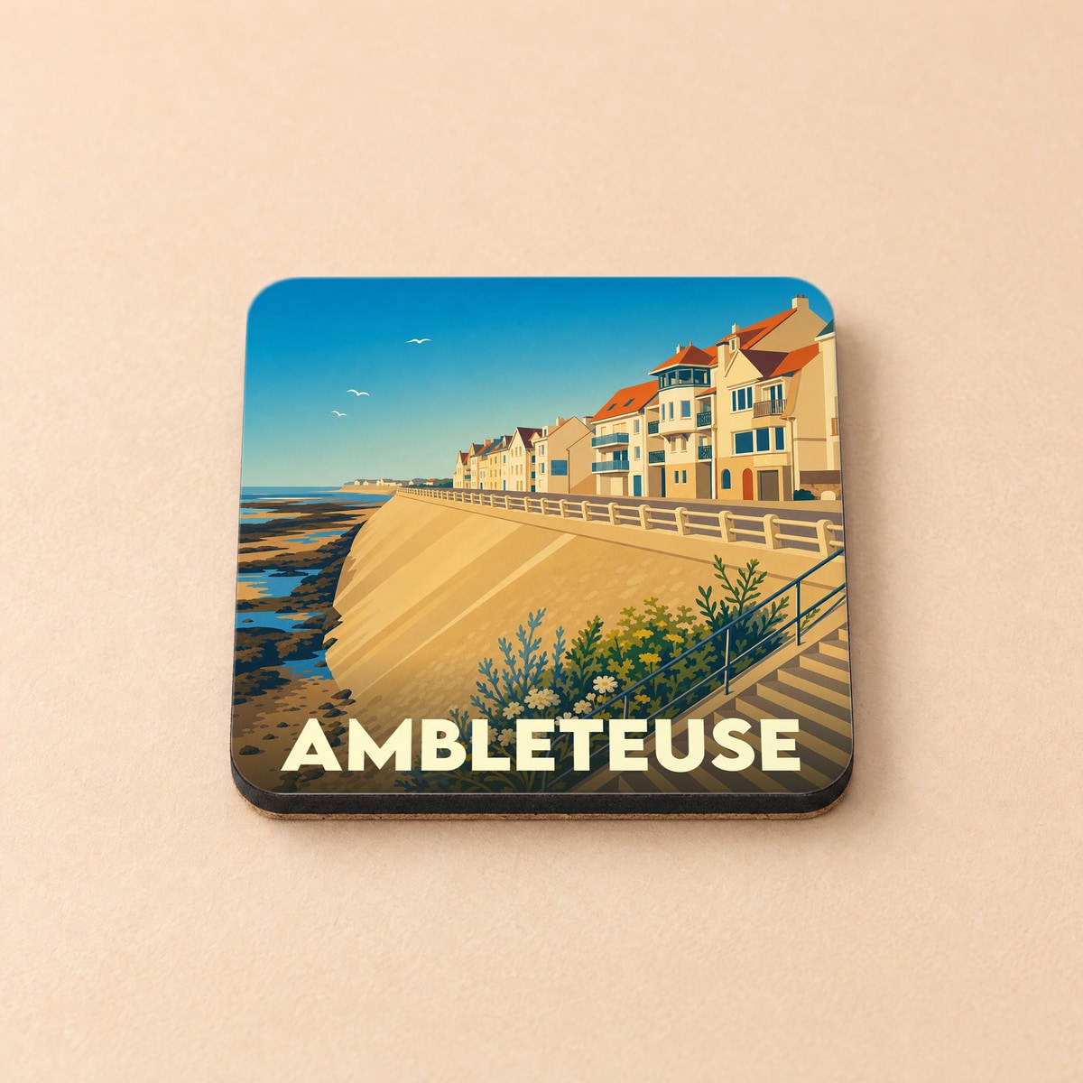 Dessous de verre souvenir de la ville d'Ambleteuse avec une illustration stylisée du front de mer.