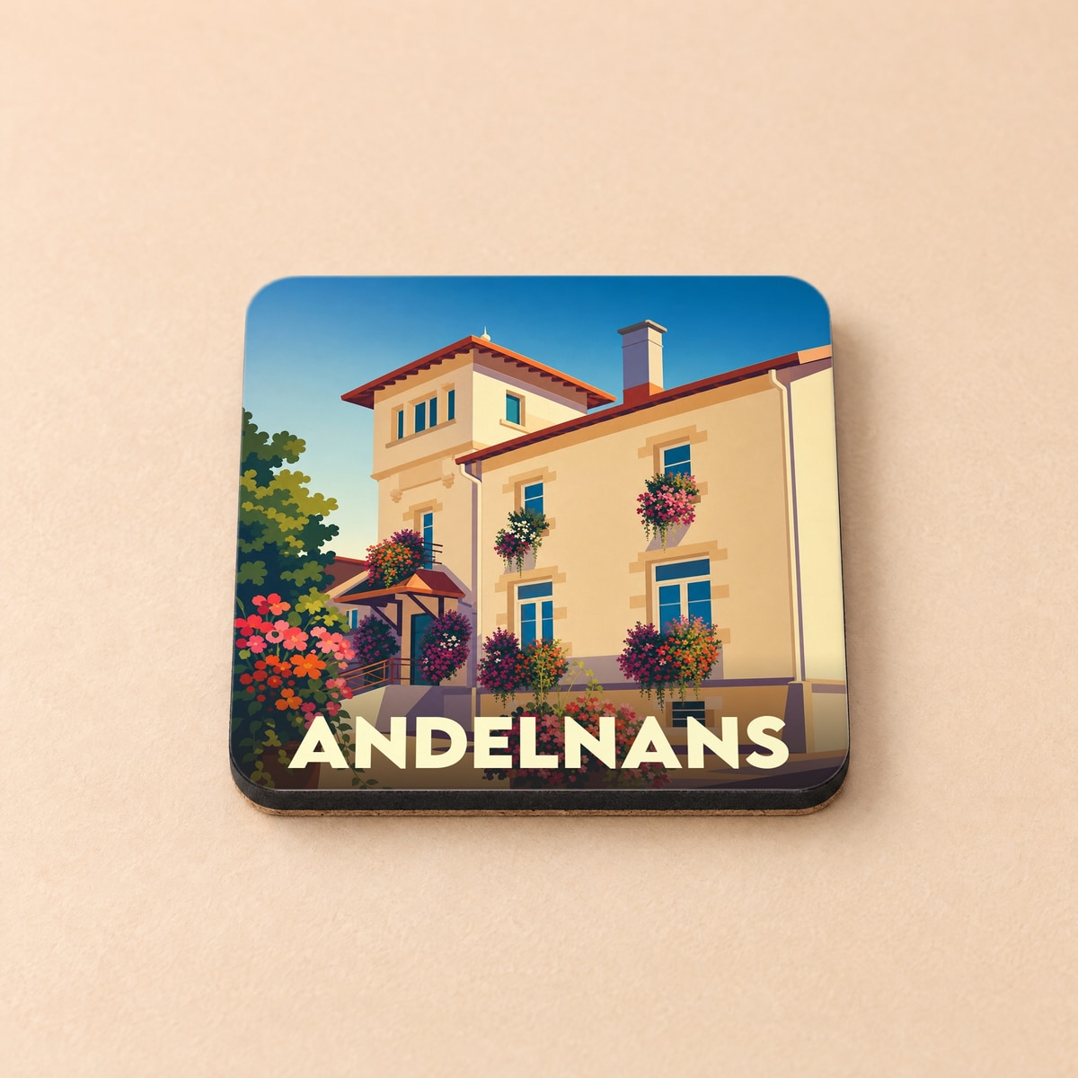 Dessous de verre souvenir de la ville de Andelnans avec une illustration stylisée.