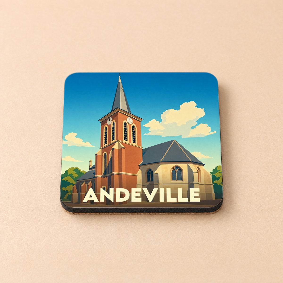 Dessous de verre souvenir de la ville d'Andeville illustré d'une église stylisée sous un ciel bleu.