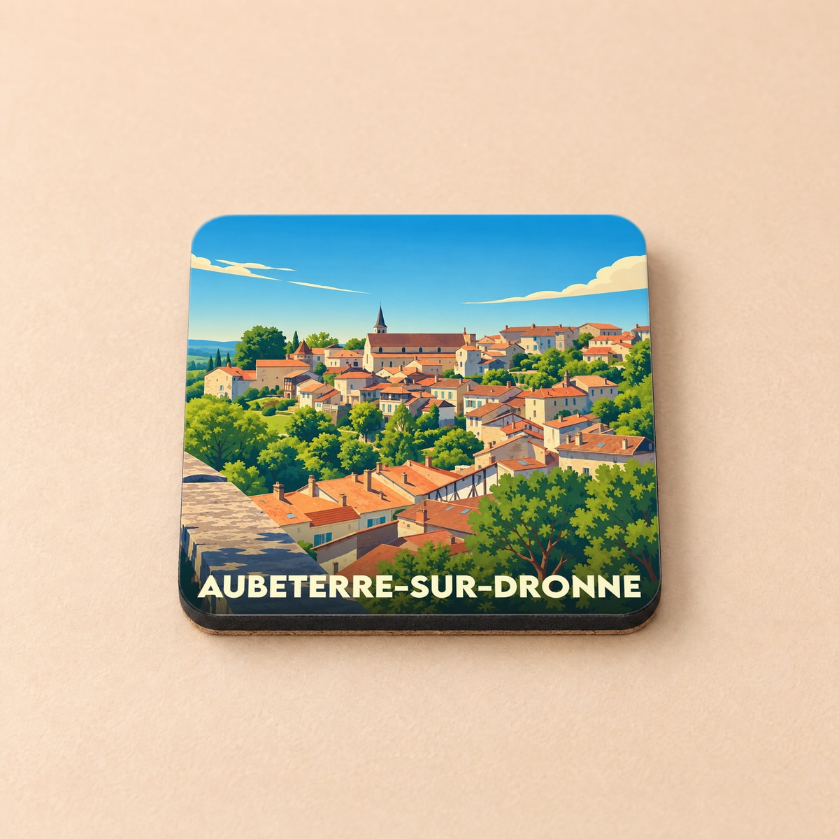 Dessous de verre souvenir de la ville de Aubeterre-sur-Dronne avec une illustration stylisée du village.