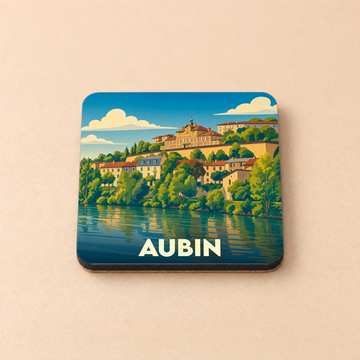 Dessous de verre souvenir de la ville de Aubin avec une illustration stylisée.