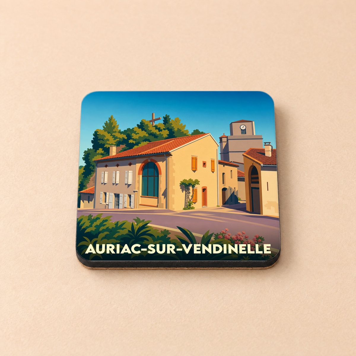 Dessous de verre souvenir de la ville de Auriac-sur-Vendinelle avec une illustration stylisée de son architecture.