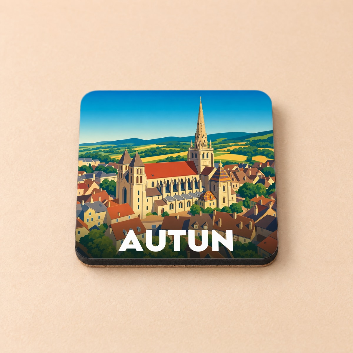 Dessous de verre souvenir de la ville d'Autun arborant une illustration colorée de sa cathédrale et de ses paysages environnants.