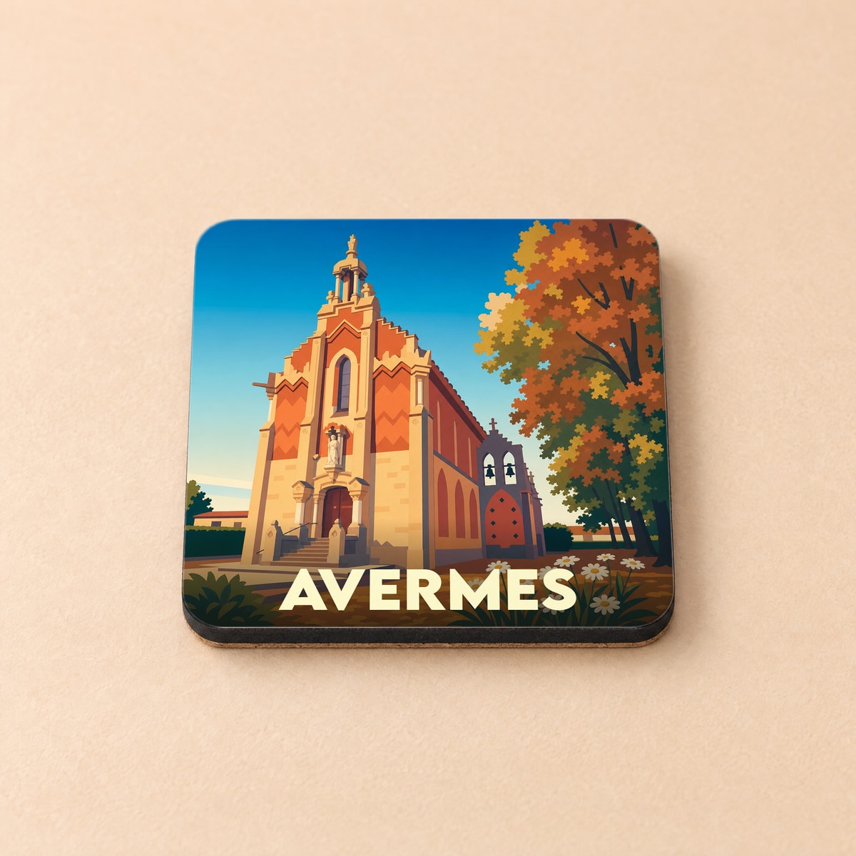 Dessous de verre souvenir de la ville d'Avermes avec une illustration stylisée de son église en automne.
