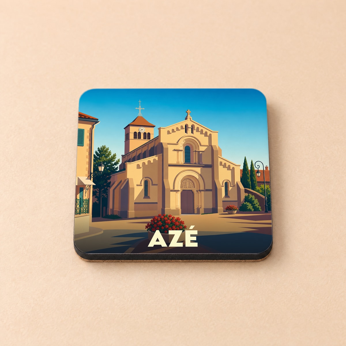 Dessous de verre souvenir de la ville d'Azé avec une illustration stylisée de son église.