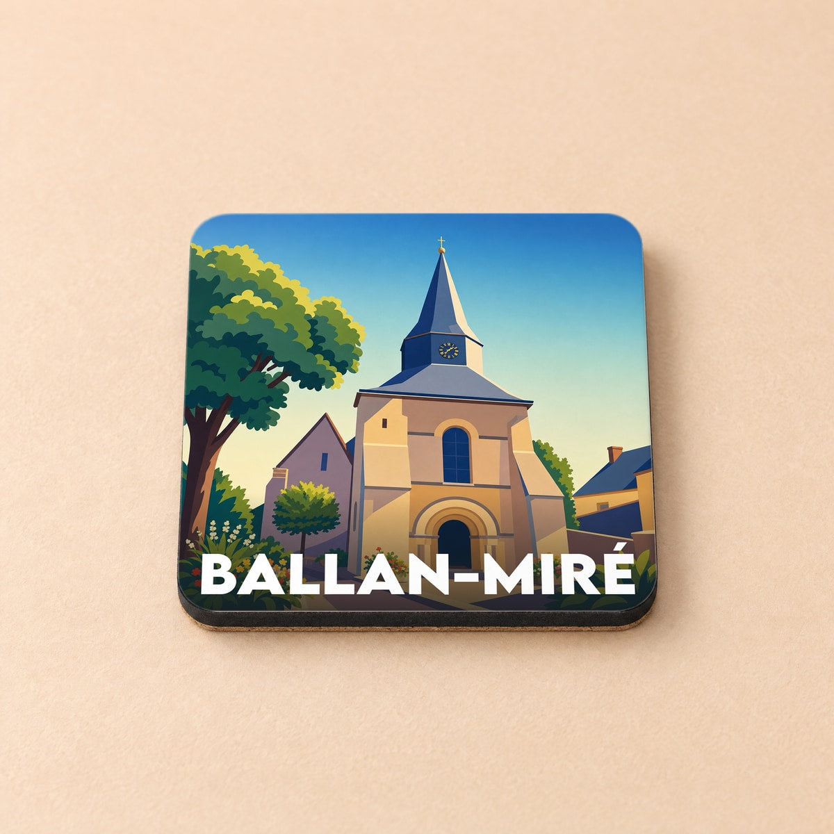 Dessous de verre souvenir de la ville de Ballan-Miré avec une illustration stylisée de son église.