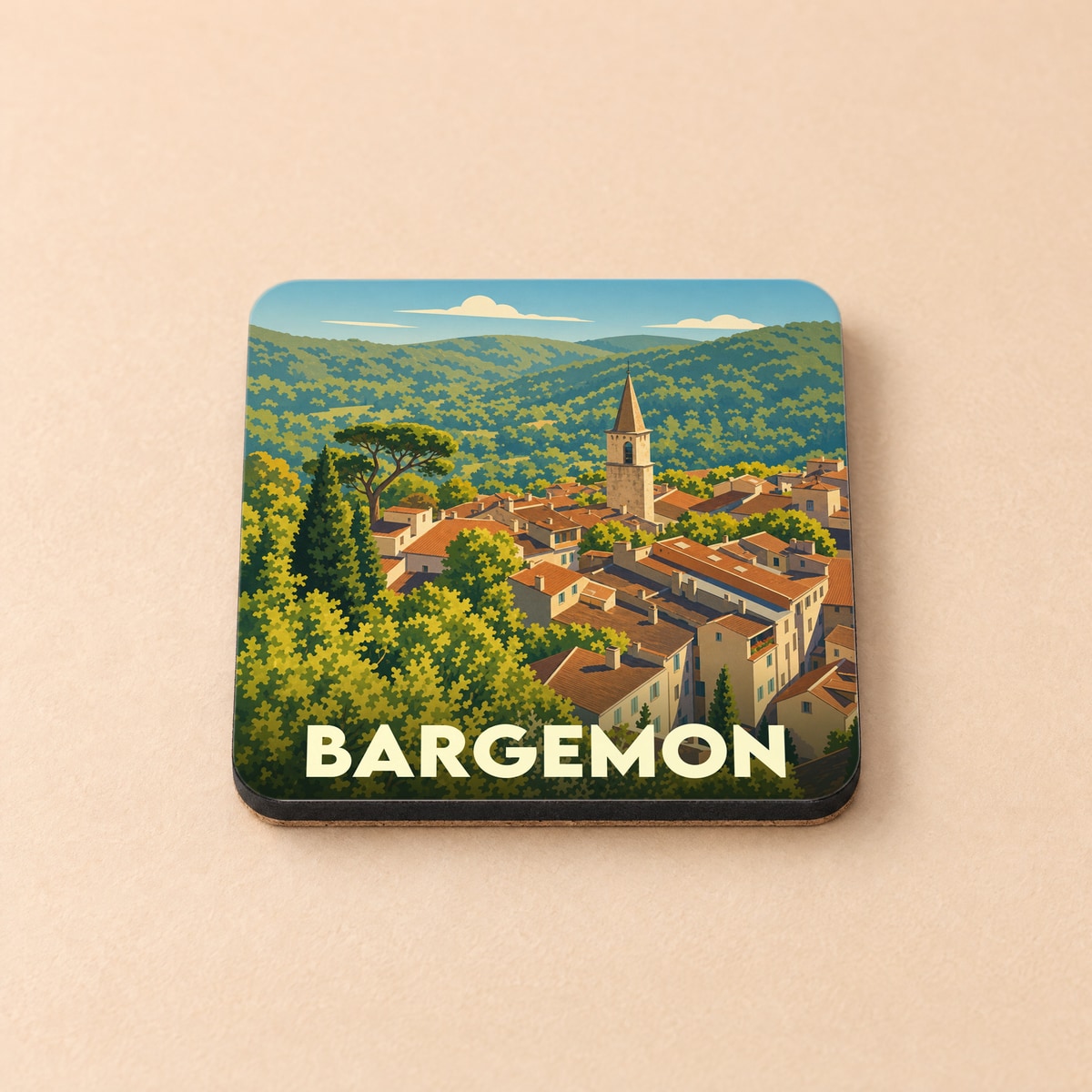 Dessous de verre souvenir de la ville de Bargemon avec une illustration stylisée d'un village perché.
