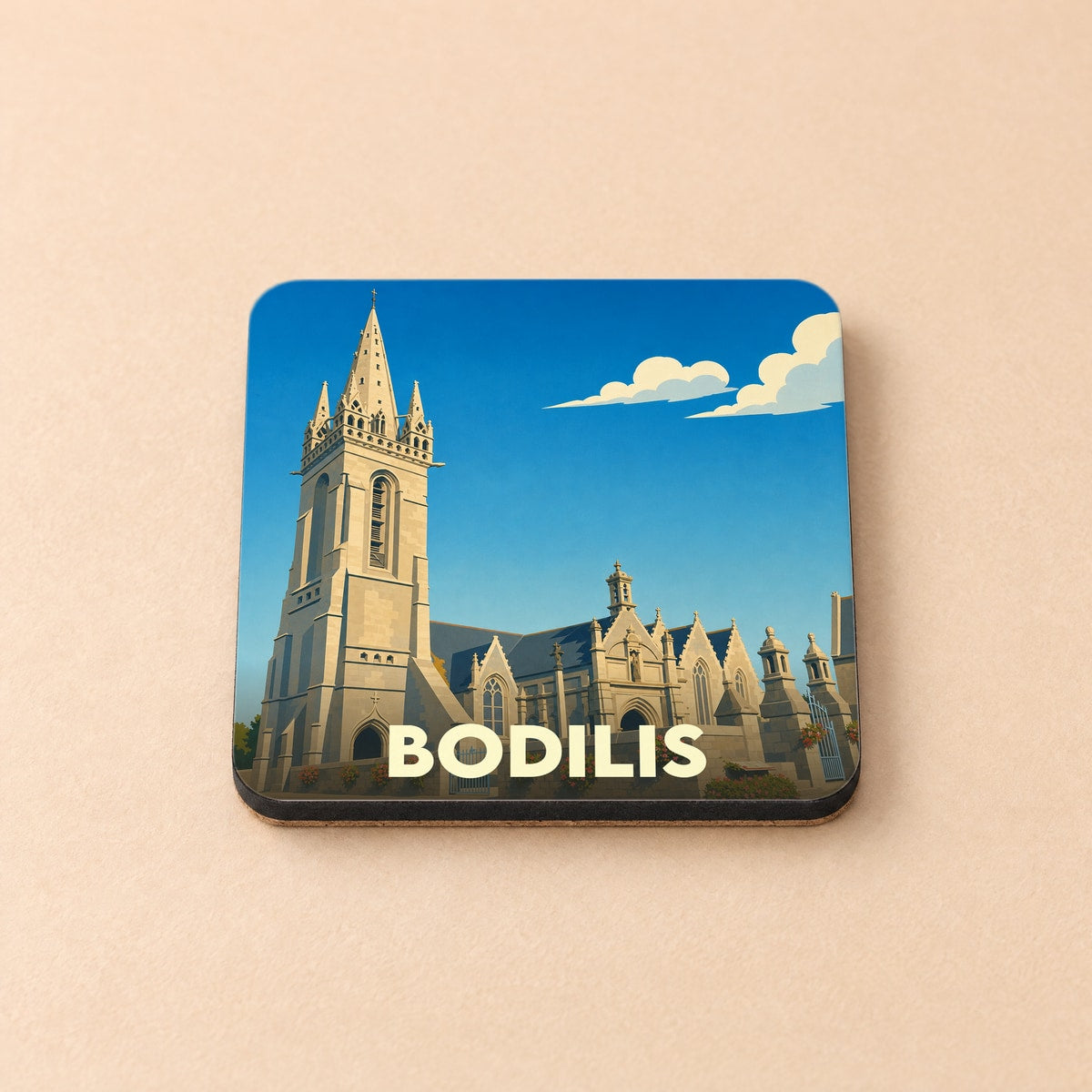 Dessous de verre souvenir de la ville de Bodilis avec une illustration stylisée de son église.