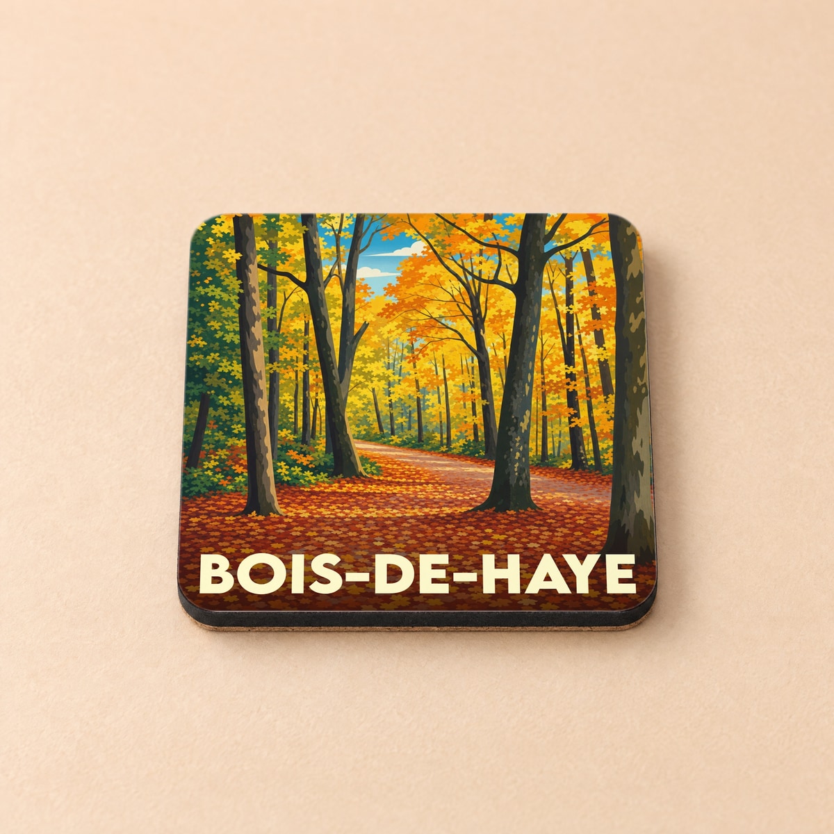 Dessous de verre souvenir de la ville de Bois-de-Haye avec une illustration d'une forêt en automne.
