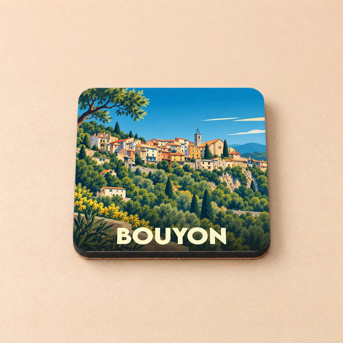 Dessous de verre souvenir de la ville de Bouyon avec une illustration stylisée de son village perché.