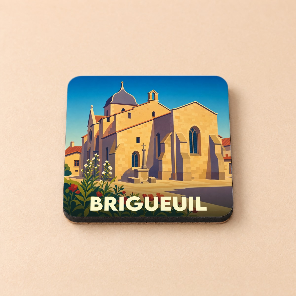 Dessous de verre souvenir de la ville de Brigueuil avec une illustration stylisée de son église.