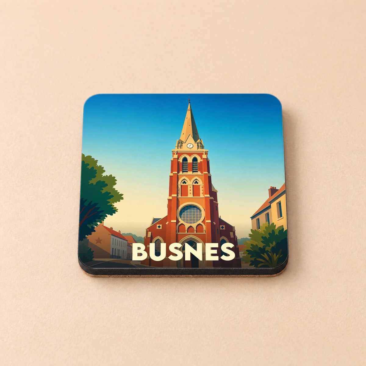 Dessous de verre souvenir de la ville de Busnes avec une illustration stylisée de son église.