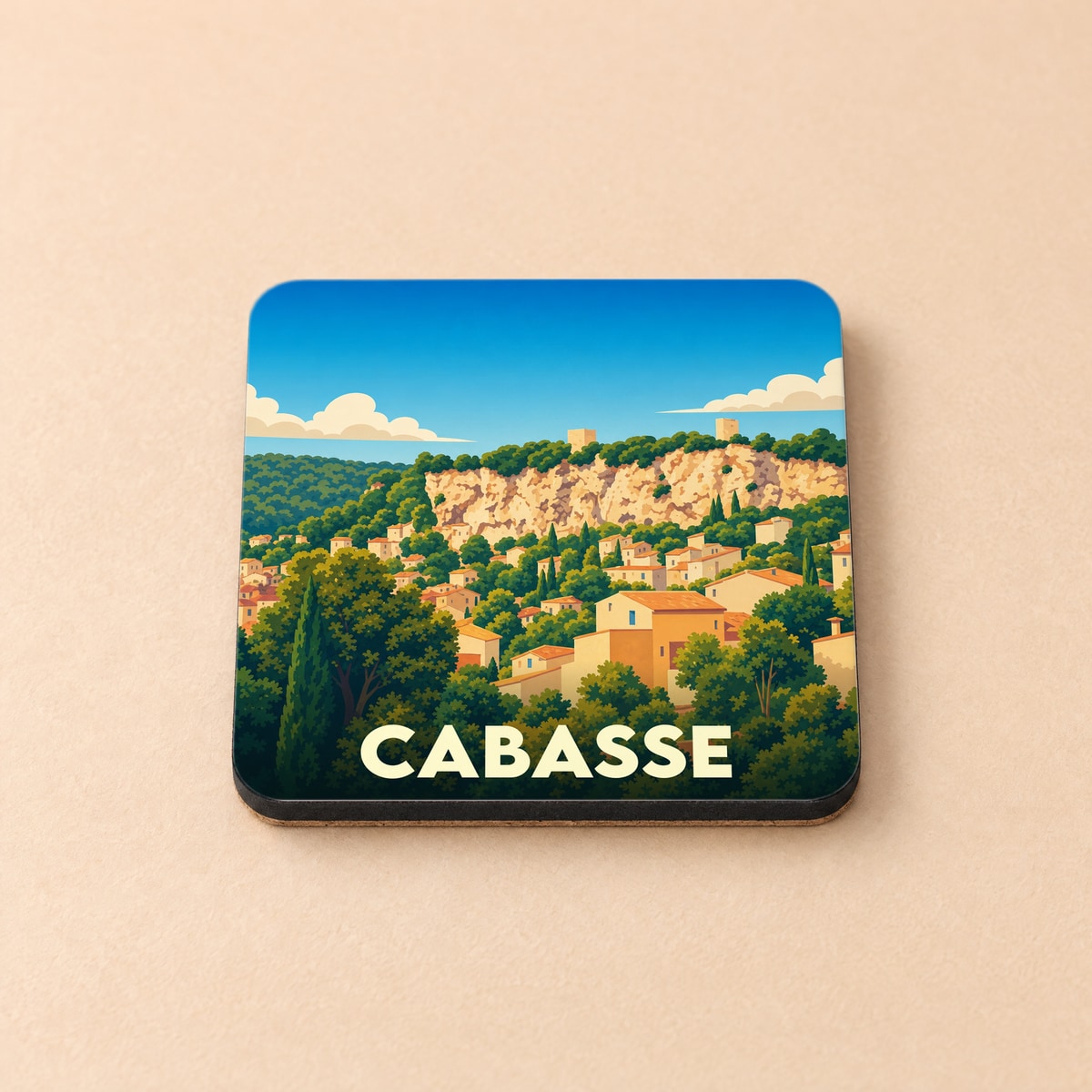 Dessous de verre souvenir de la ville de Cabasse avec une illustration stylisée d'un village perché.
