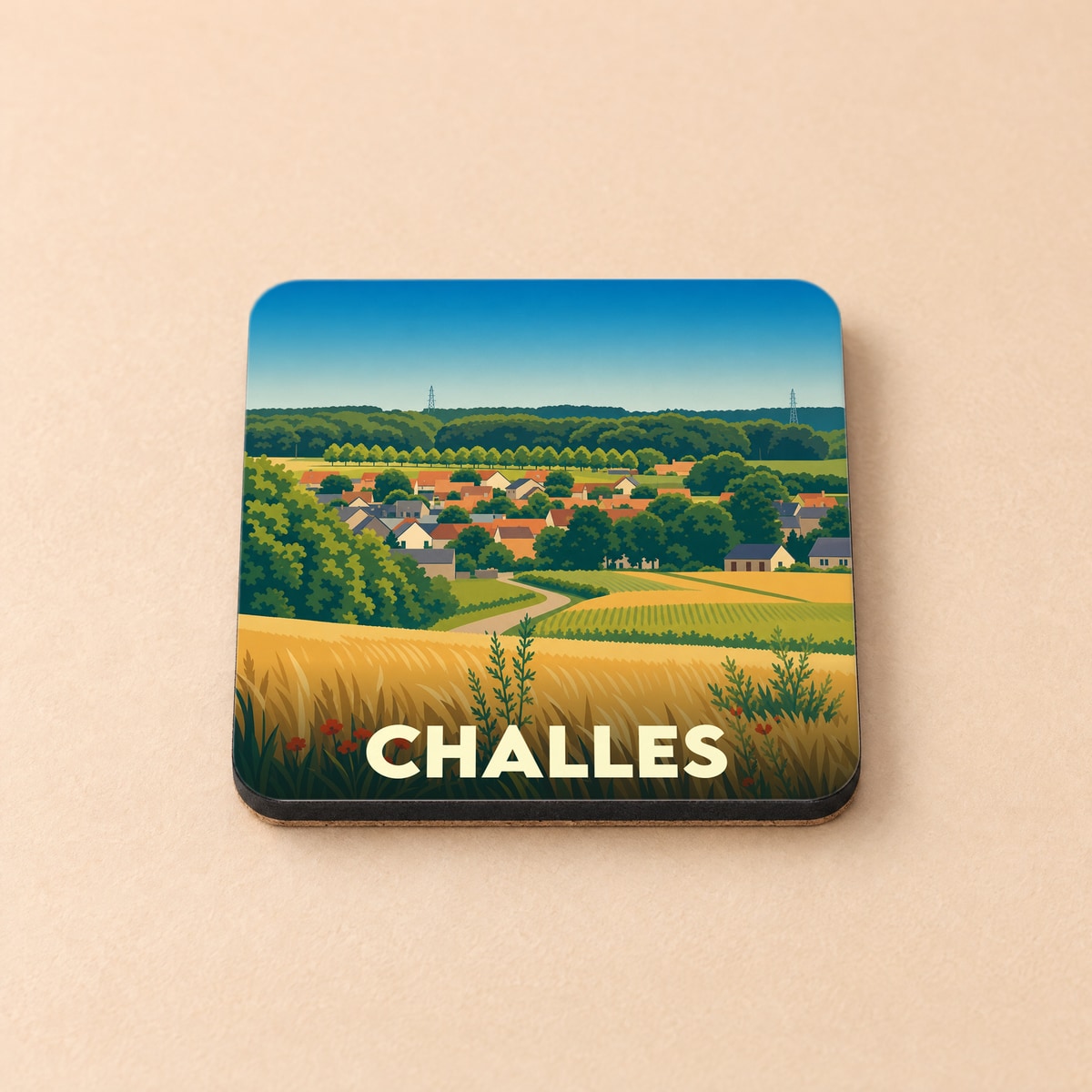 Dessous de verre souvenir de la ville de Challes avec une illustration de paysage rural stylisée.