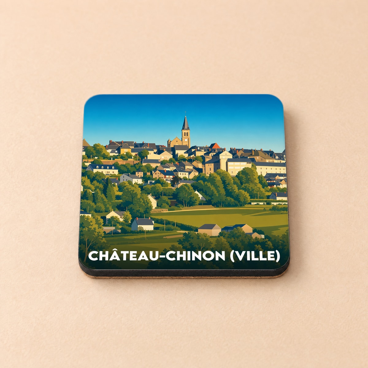 Dessous de verre souvenir de la ville de Château-Chinon (Ville) avec une illustration stylisée d'un paysage urbain.
