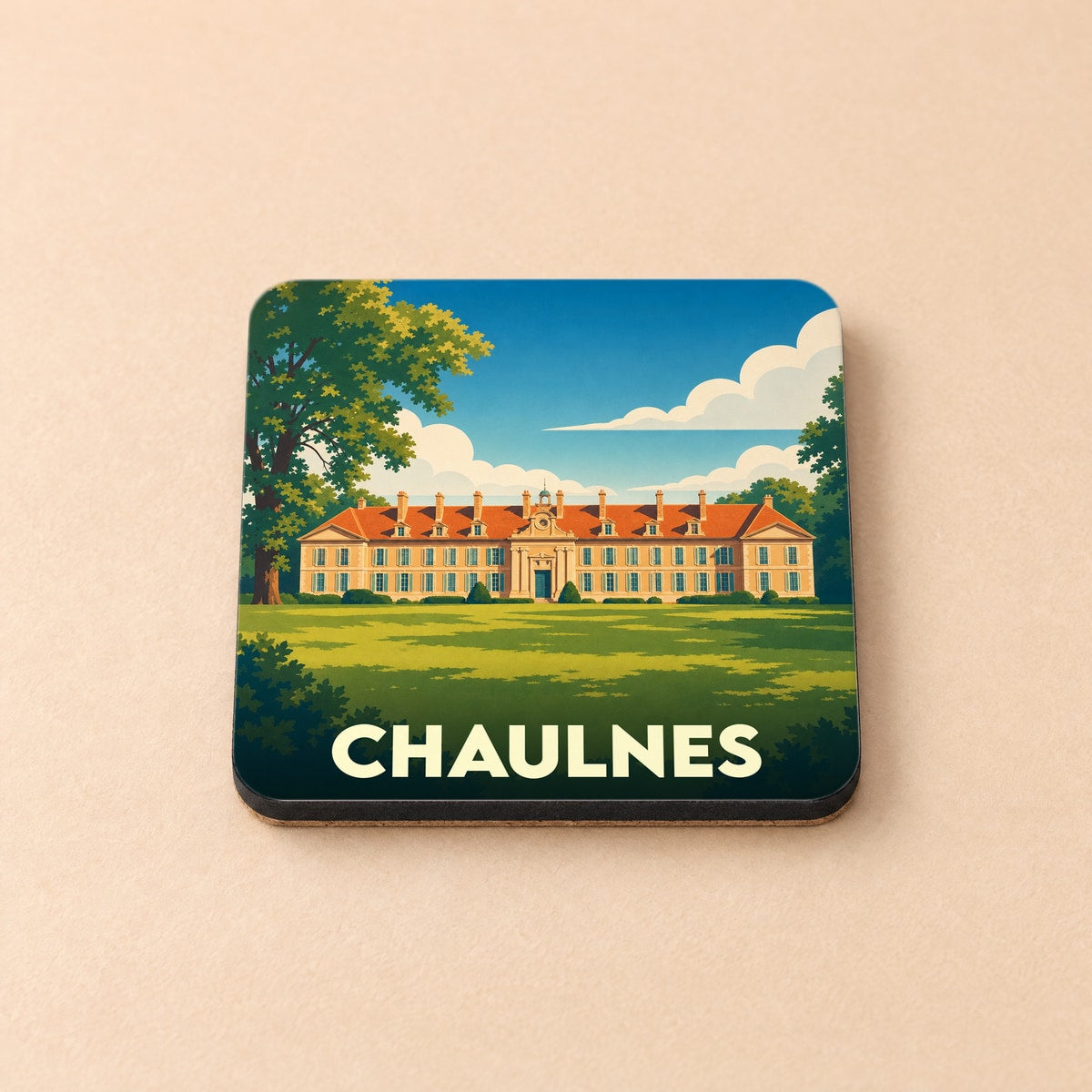 Dessous de verre souvenir de la ville de Chaulnes illustré par un château stylisé sous un ciel bleu.