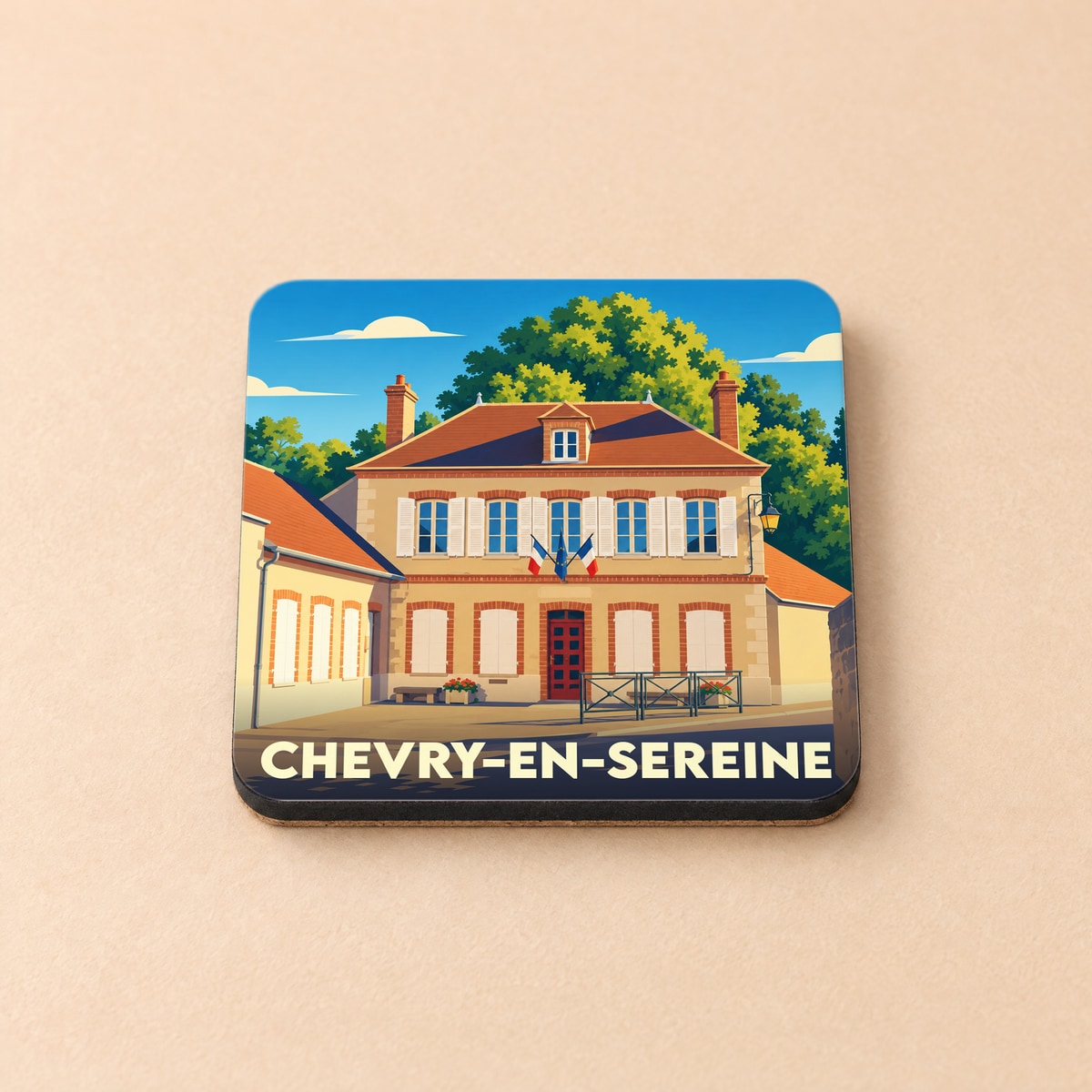 Dessous de verre souvenir de la ville de Chevry-en-Sereine avec une illustration stylisée de sa mairie.