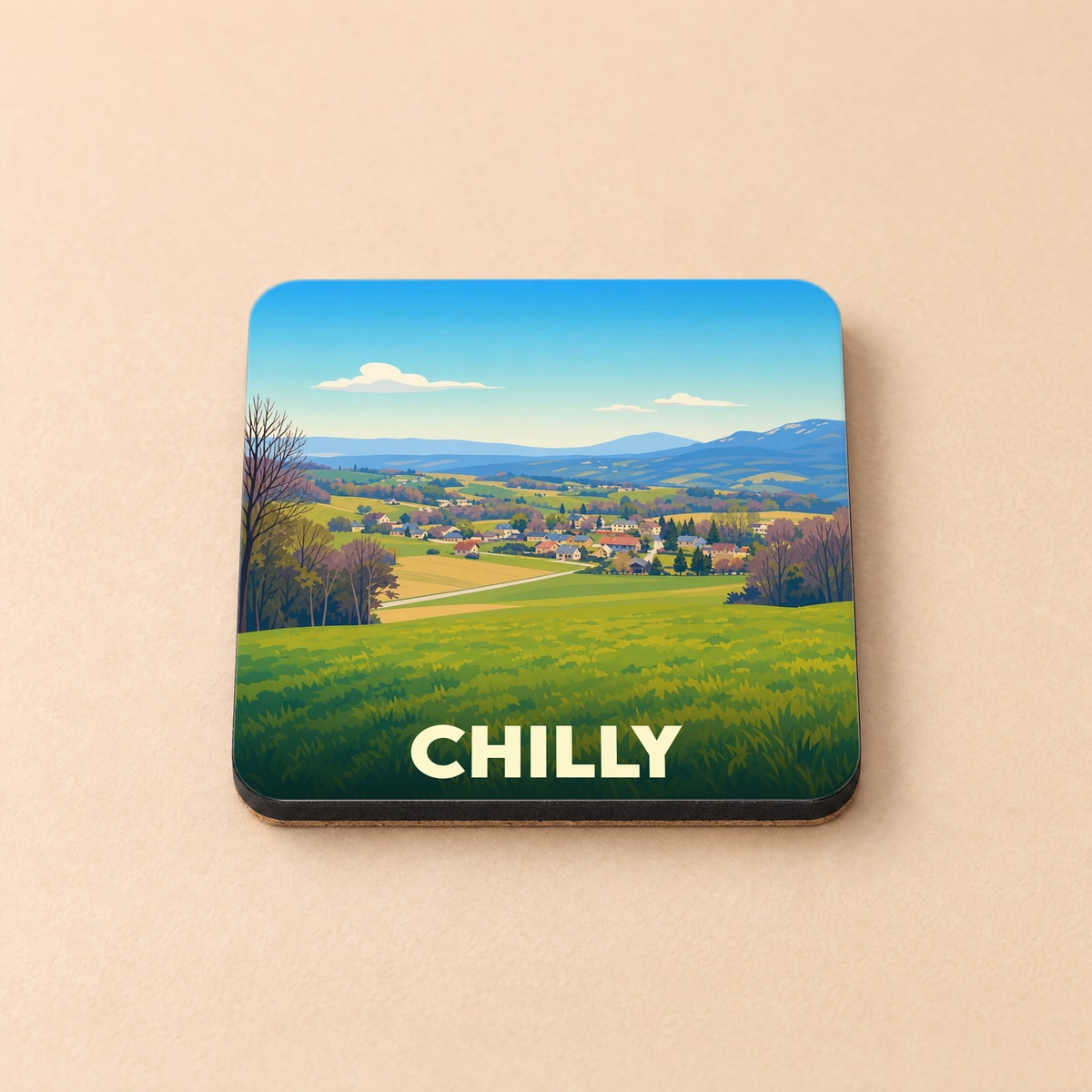 Dessous de verre souvenir de la ville de Chilly avec une illustration de paysage champêtre.