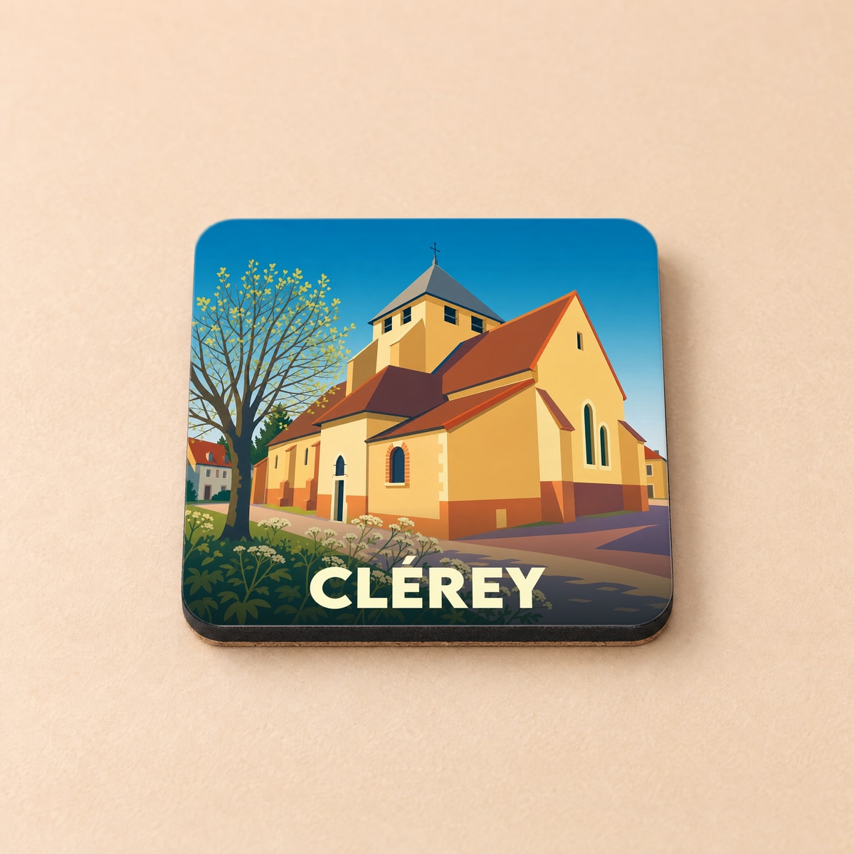 Dessous de verre souvenir de la ville de Clérey avec une illustration stylisée de son église.