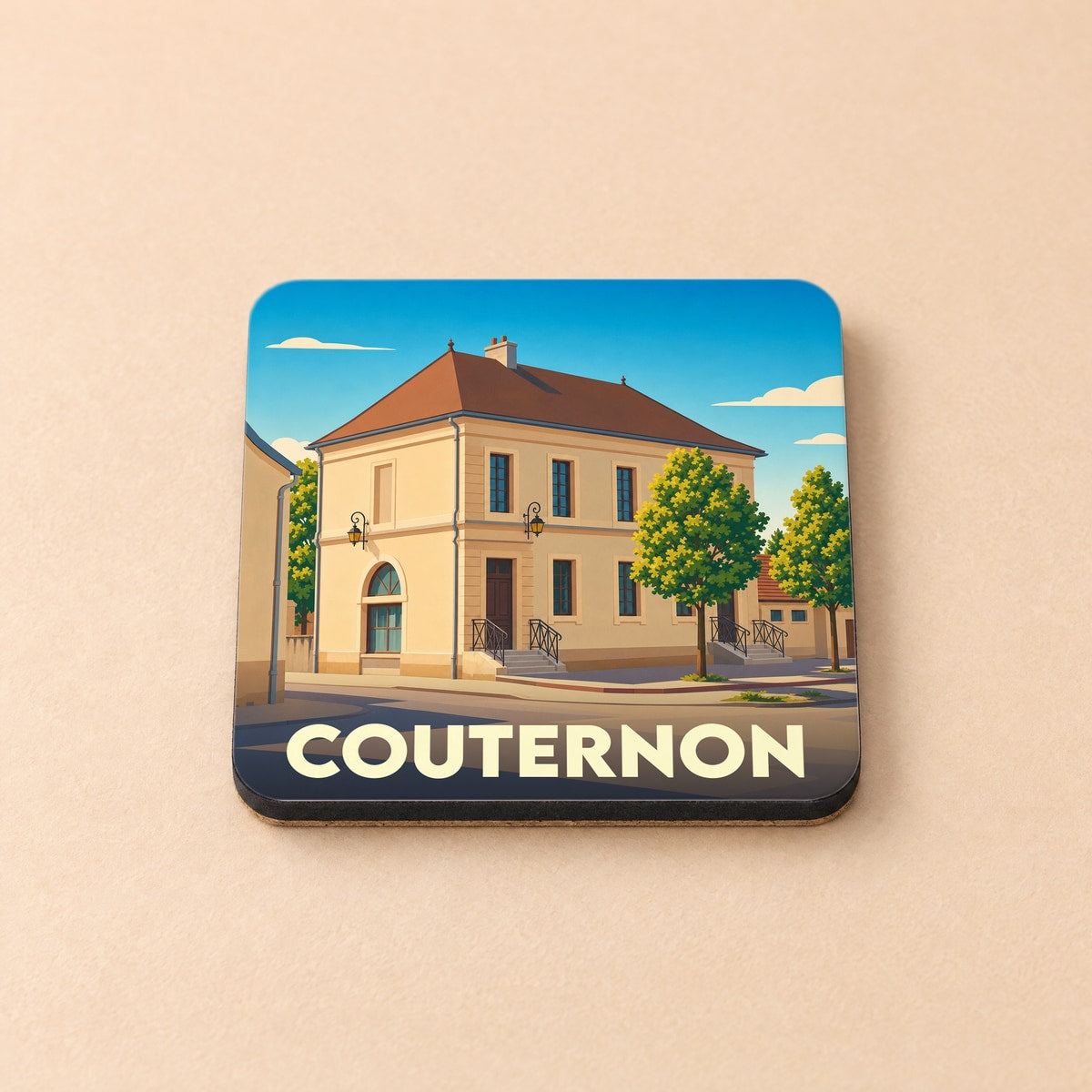 Dessous de verre souvenir de la ville de Couternon avec une illustration stylisée d'un bâtiment historique.
