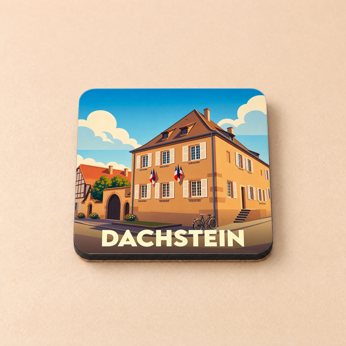 Dessous de verre souvenir de la ville de Dachstein avec une illustration stylisée d'un bâtiment traditionnel.