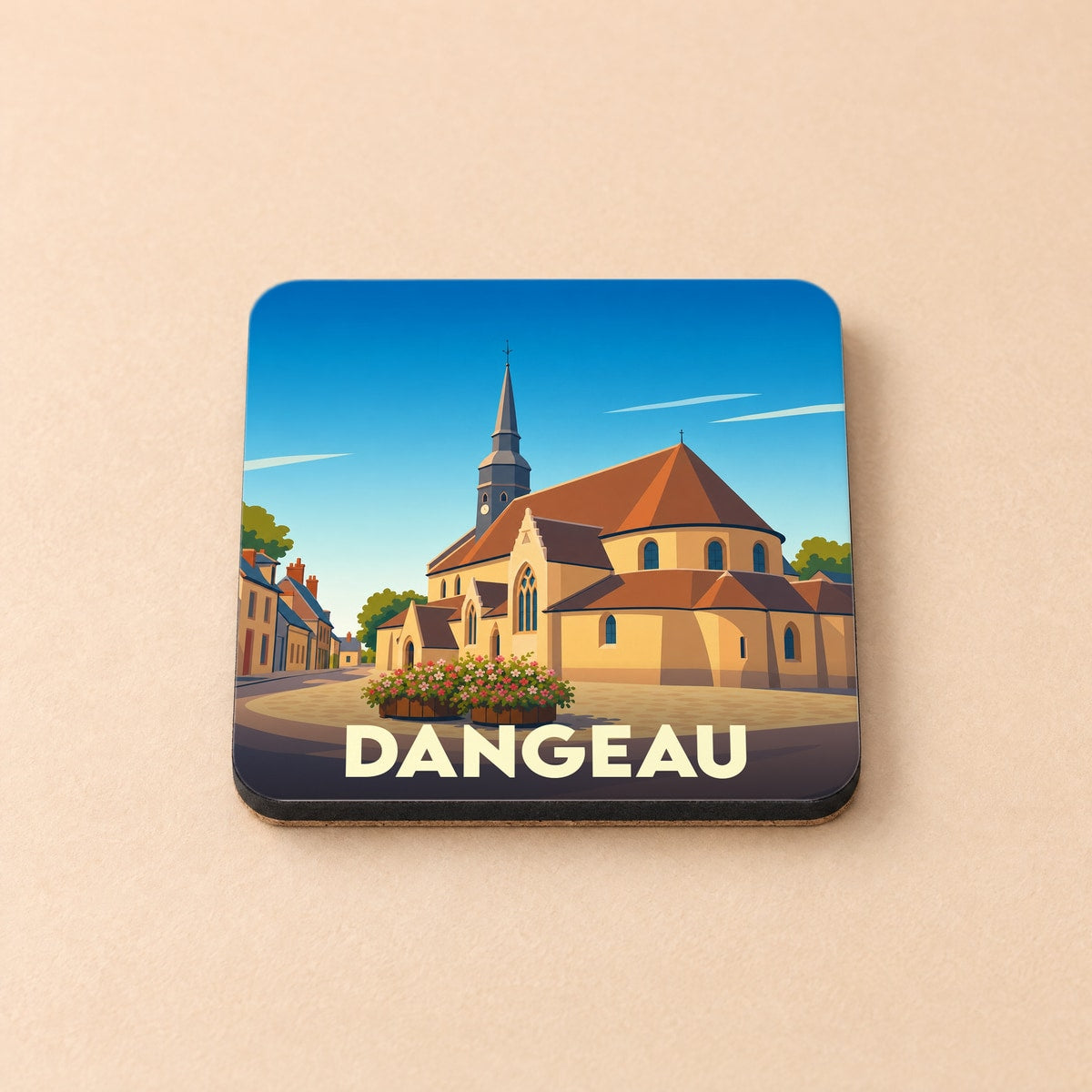 Dessous de verre souvenir de la ville de Dangeau avec une illustration stylisée de son église.