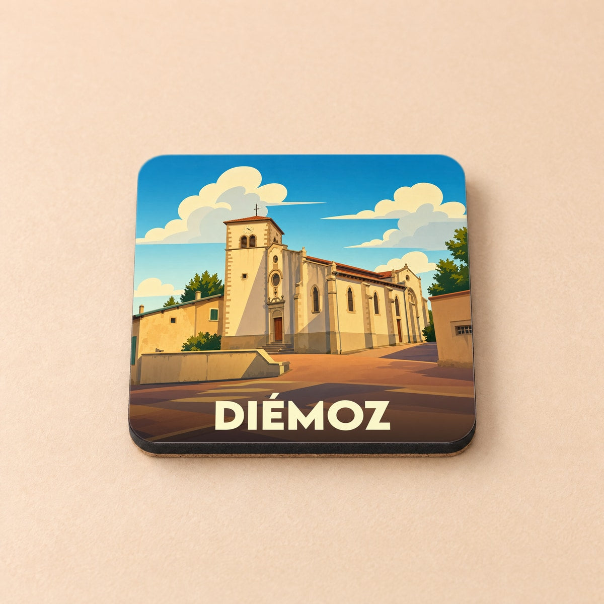 Dessous de verre souvenir de la ville de Diémoz avec une illustration stylisée de son église.