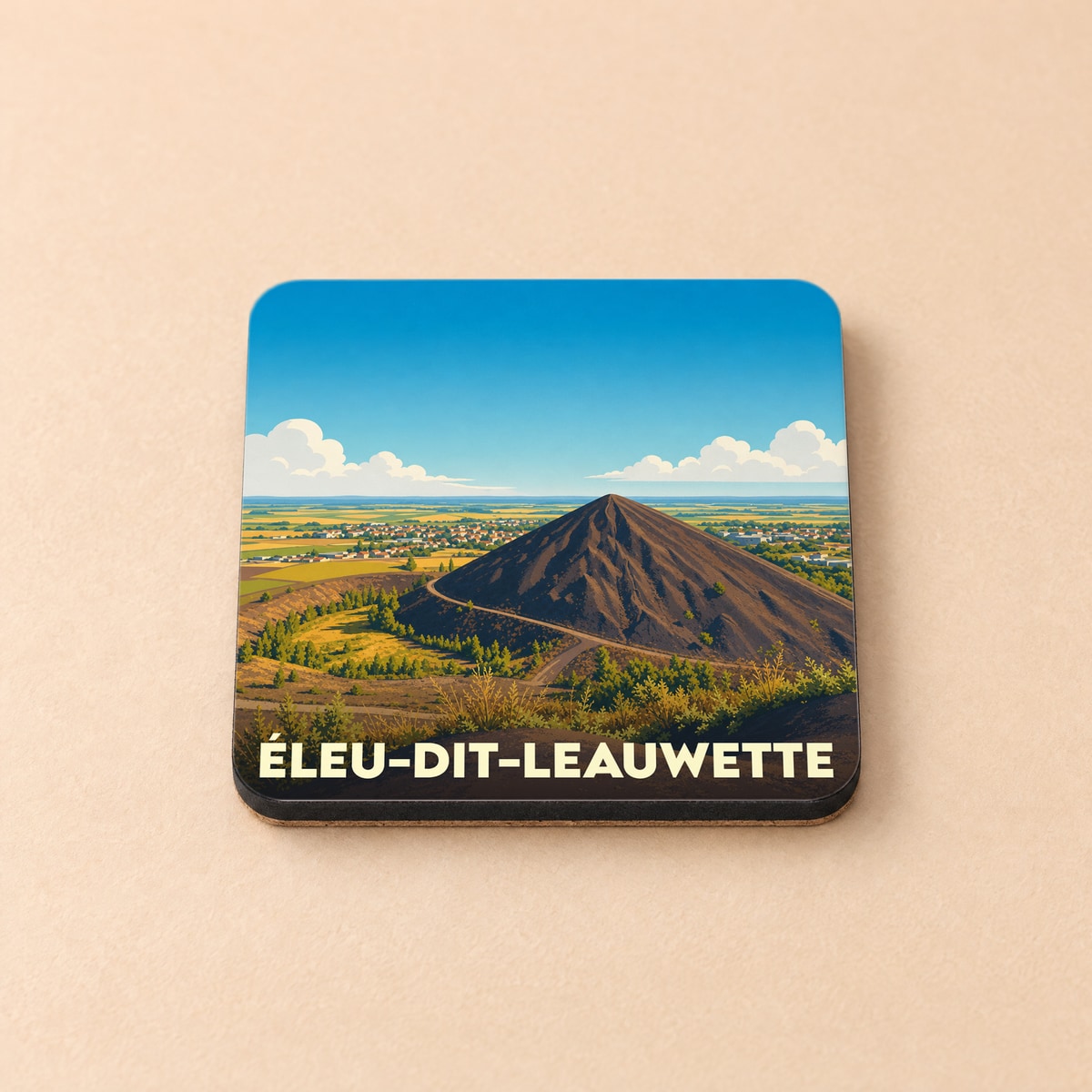 Dessous de verre souvenir de la ville d'Éleu-dit-Leauwette avec une illustration stylisée d'un terril.