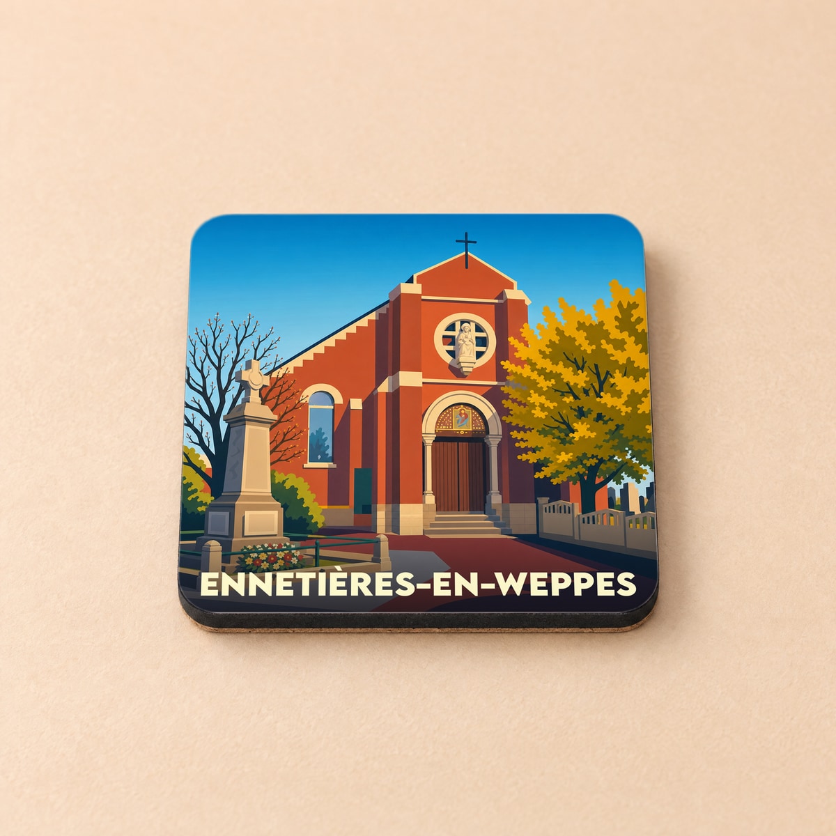 Dessous de verre souvenir de la ville d'Ennetières-en-Weppes avec une illustration stylisée de son église.