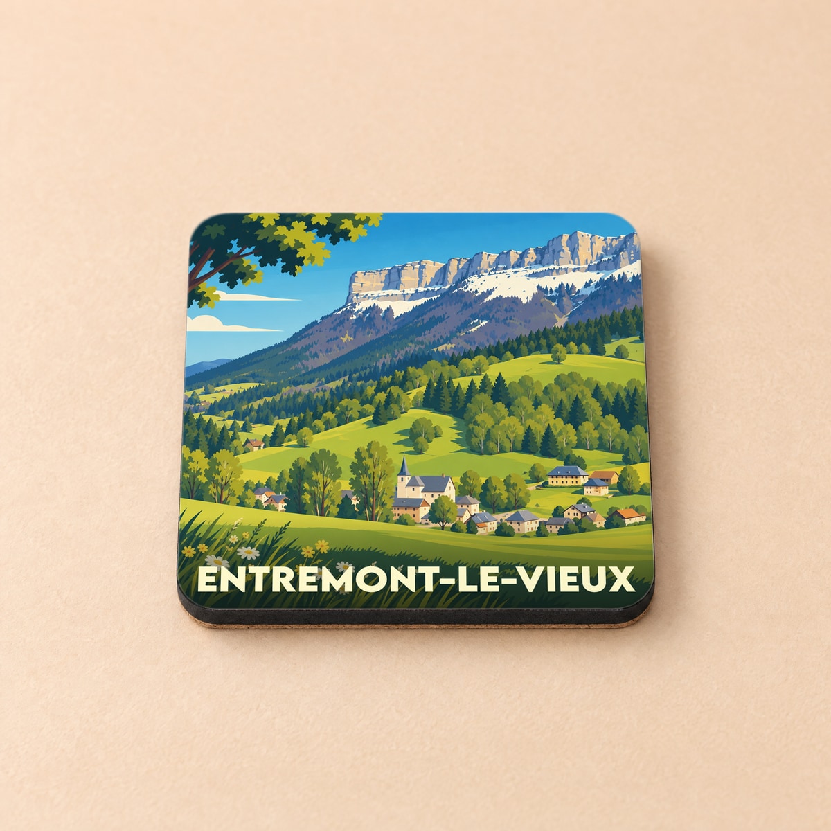 Dessous de verre souvenir de la ville d'Entremont-le-Vieux avec une illustration stylisée de montagne.