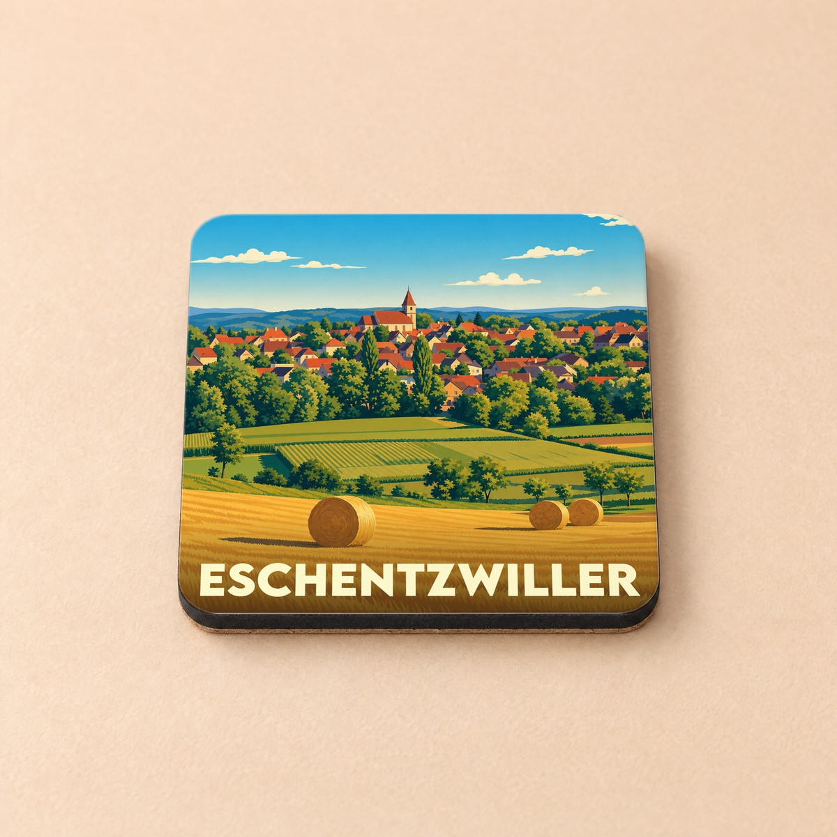 Dessous de verre souvenir de la ville de Eschentzwiller avec une illustration stylisée de son paysage rural.