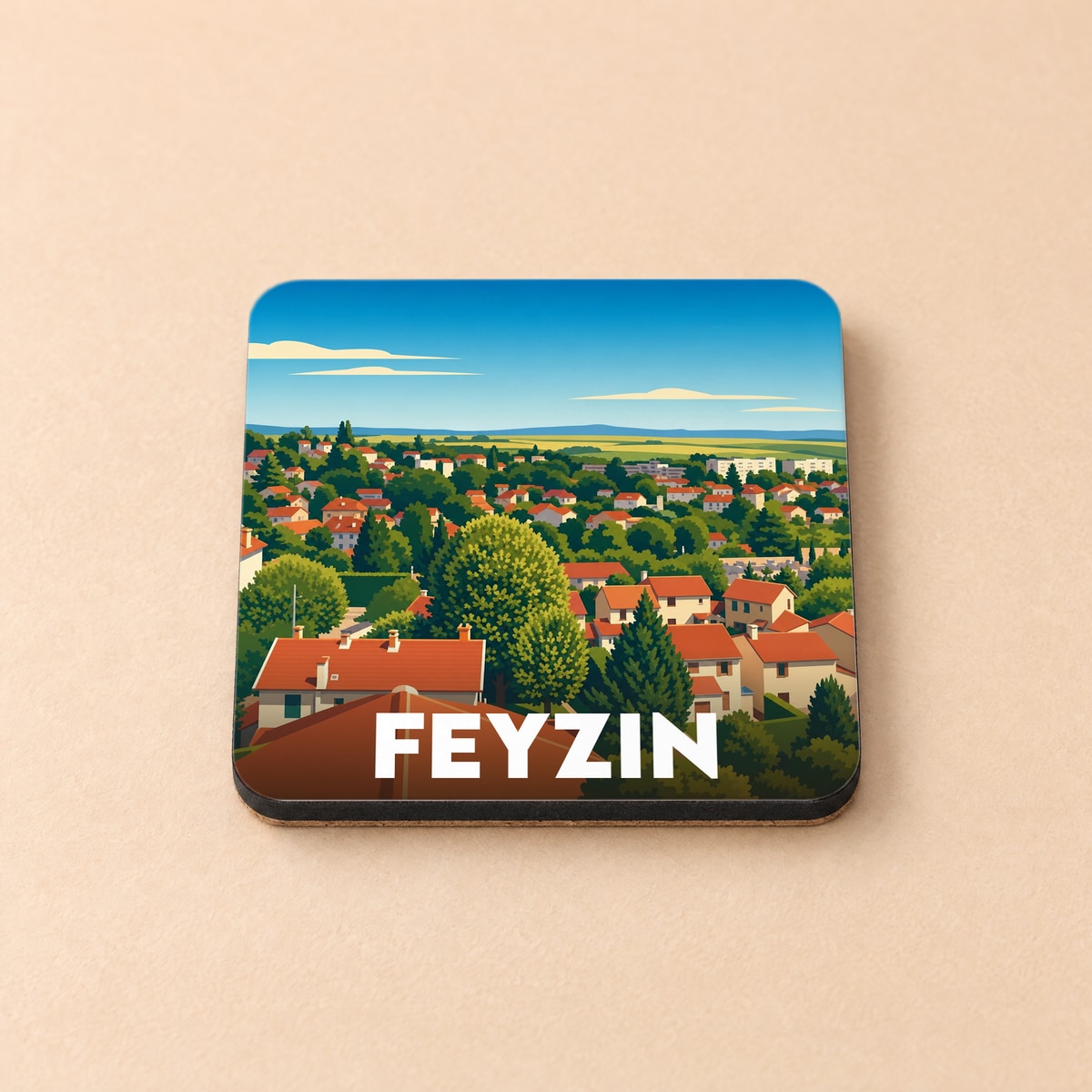 Dessous de verre souvenir de la ville de Feyzin avec une illustration stylisée d'un paysage urbain verdoyant.