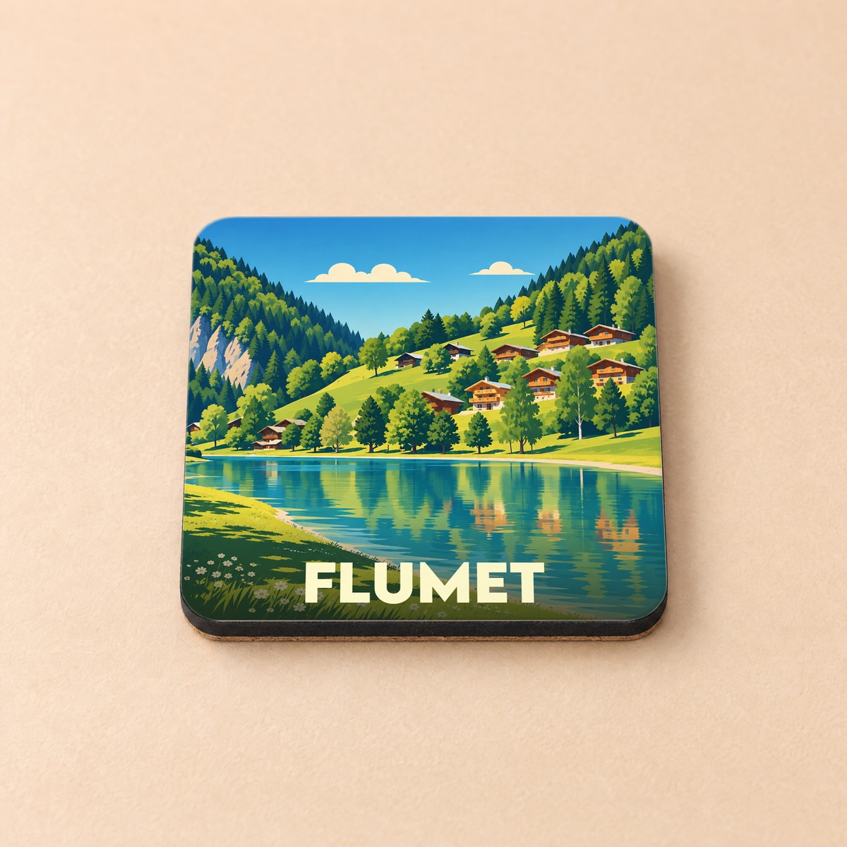 Dessous de verre souvenir de la ville de Flumet avec une illustration de paysage de montagne et de lac.