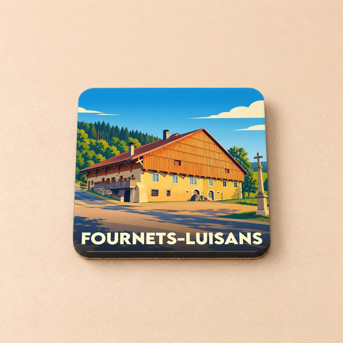 Dessous de verre souvenir de la ville de Fournets-Luisans illustré d'un chalet traditionnel jurassien.