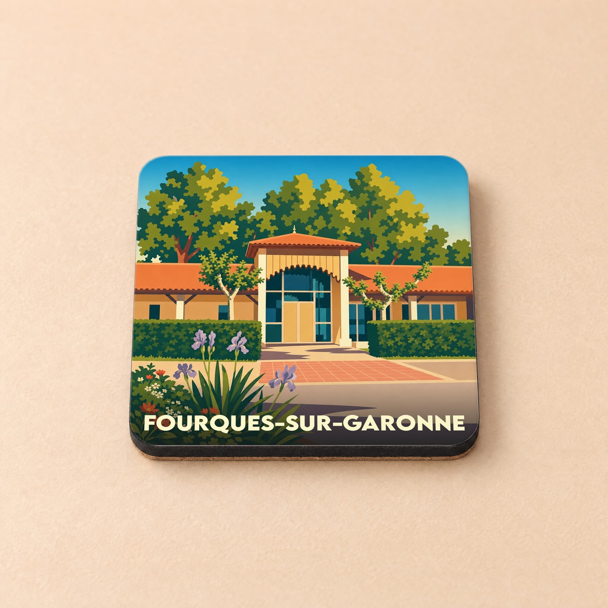 Dessous de verre souvenir de la ville de Fourques-sur-Garonne avec une illustration stylisée du patrimoine local.
