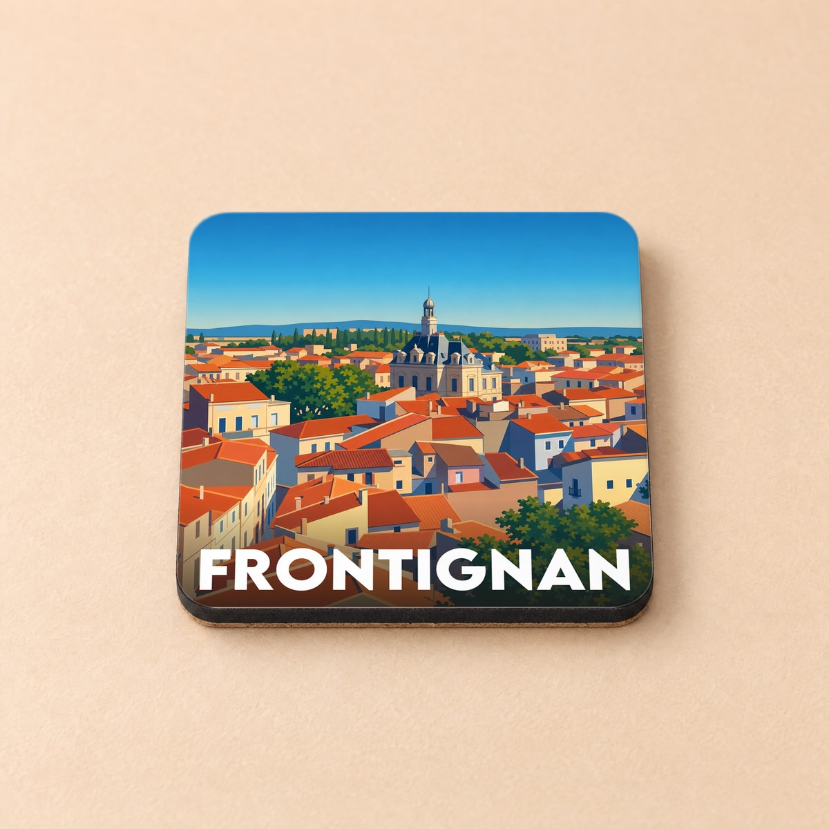 Dessous de verre souvenir de la ville de Frontignan avec une illustration stylisée de ses toits orangés.