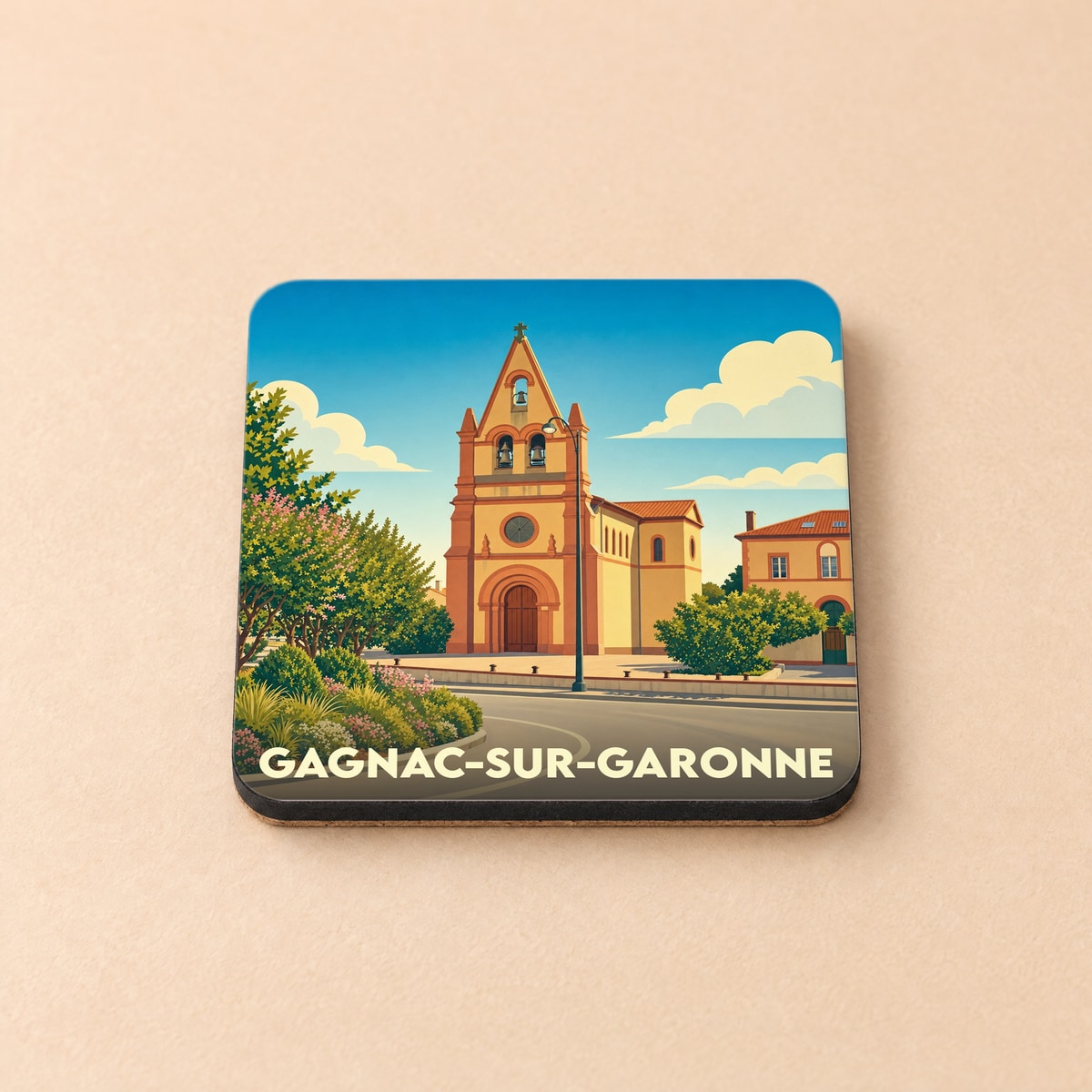 Dessous de verre souvenir de la ville de Gagnac-sur-Garonne avec une illustration stylisée de son église.