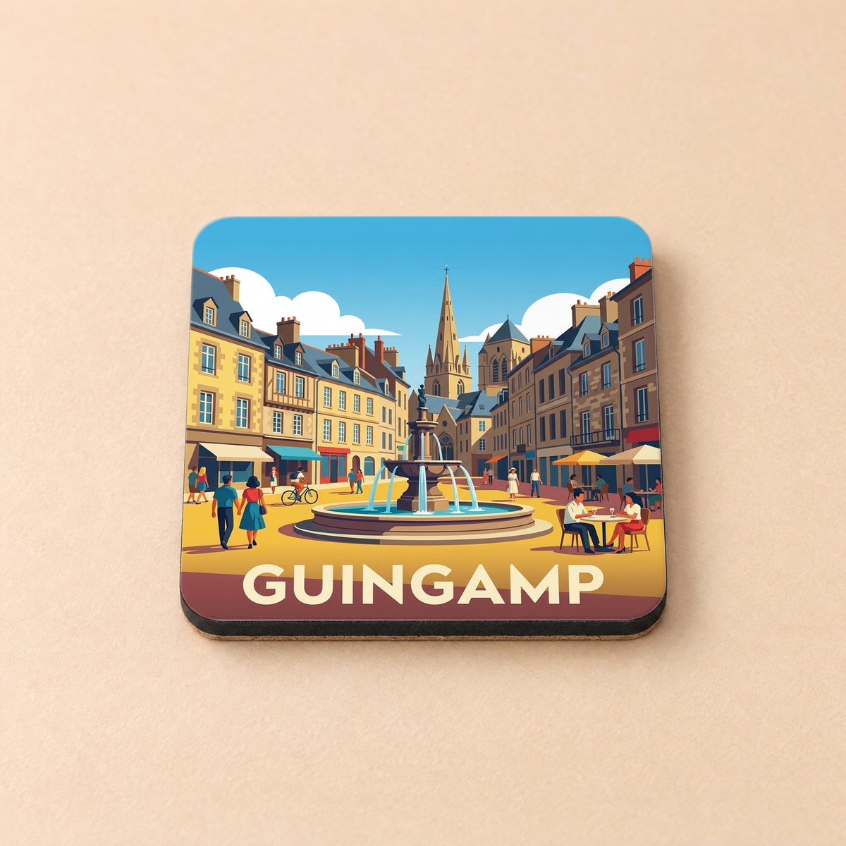 Dessous de verre souvenir de la ville de Guingamp avec une illustration stylisée d'une place animée et sa fontaine.