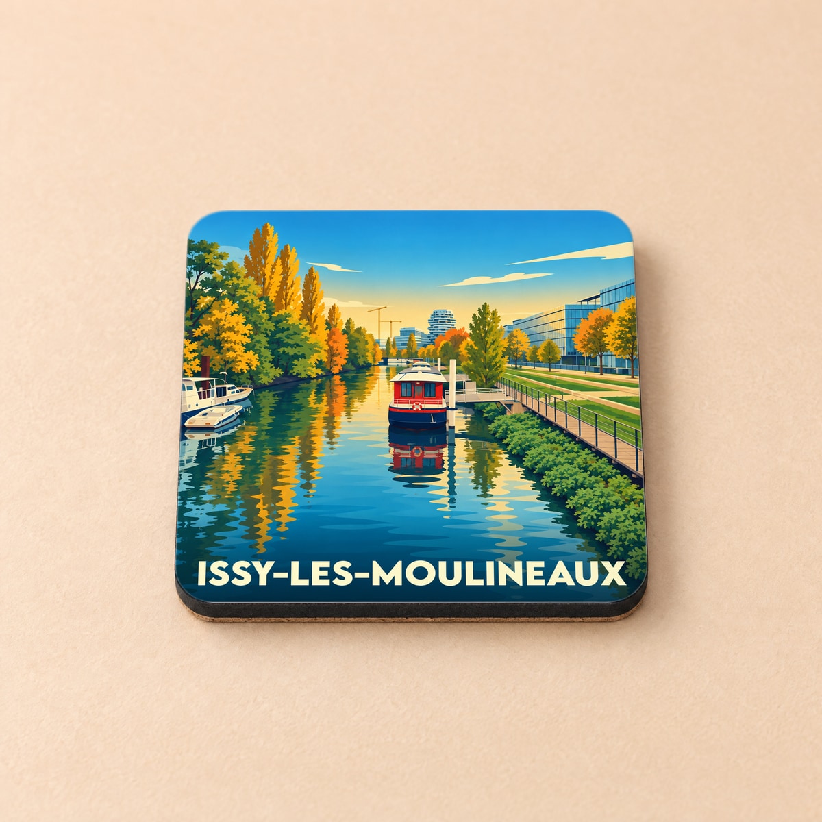 Dessous de verre souvenir de la ville d'Issy-les-Moulineaux avec une illustration stylisée des bords de Seine en automne.