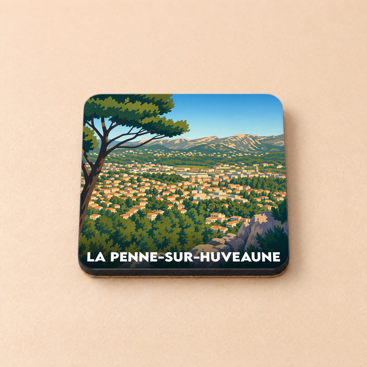 Dessous de verre souvenir de la ville de La Penne-sur-Huveaune avec une illustration de paysage panoramique.