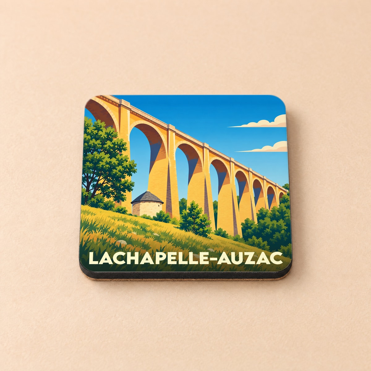 Dessous de verre souvenir de la ville de Lachapelle-Auzac avec une illustration stylisée d'un viaduc.