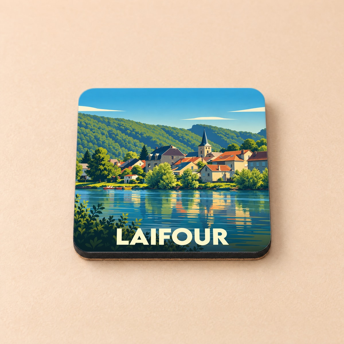 Dessous de verre souvenir de la ville de Laifour avec une illustration stylisée des bords de Meuse.