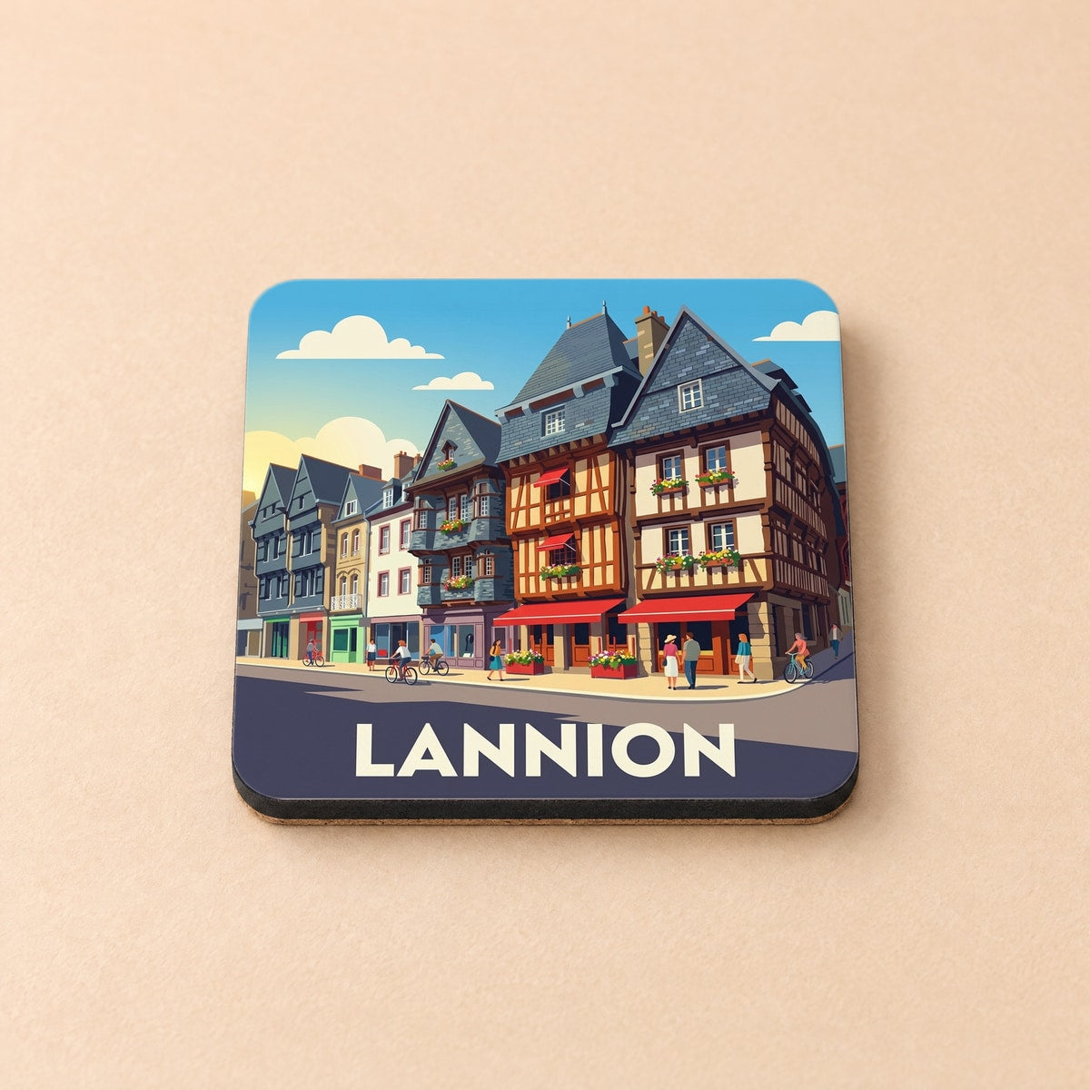 Dessous de verre souvenir de la ville de Lannion orné d'une illustration stylisée de ses maisons à colombages.